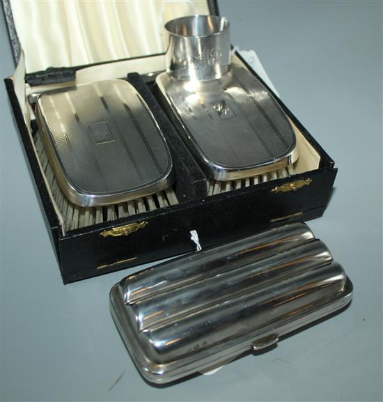 Silver cigar case, silver napkin ring & pair of gents silver-backed brushes (case a.f.)